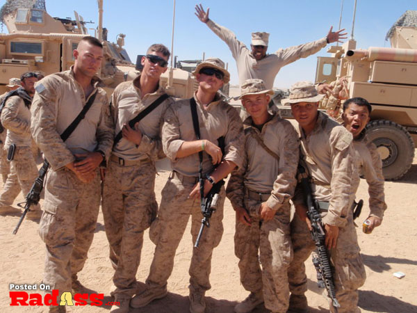 A group of American heroes, marines, posing for a photo.
