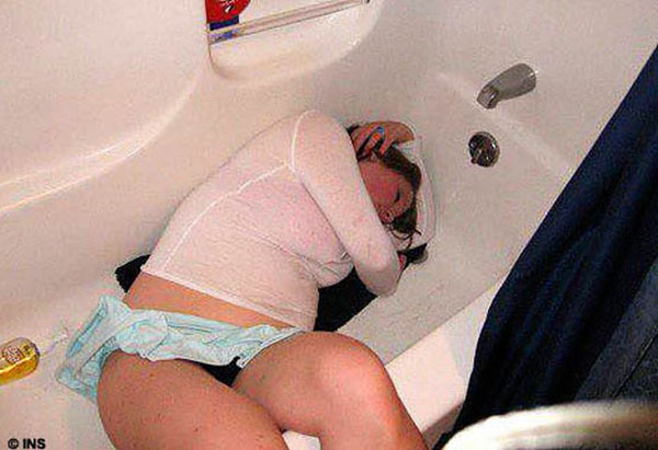 A woman enjoying a relaxing soak in a bathtub.