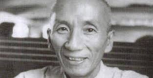 A photo of a (Y)ip Man smiling.