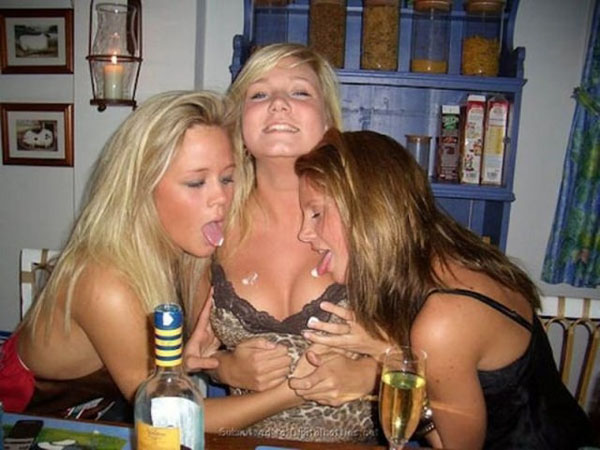 Three women posing for a picture at a restaurant. (56 Pics)