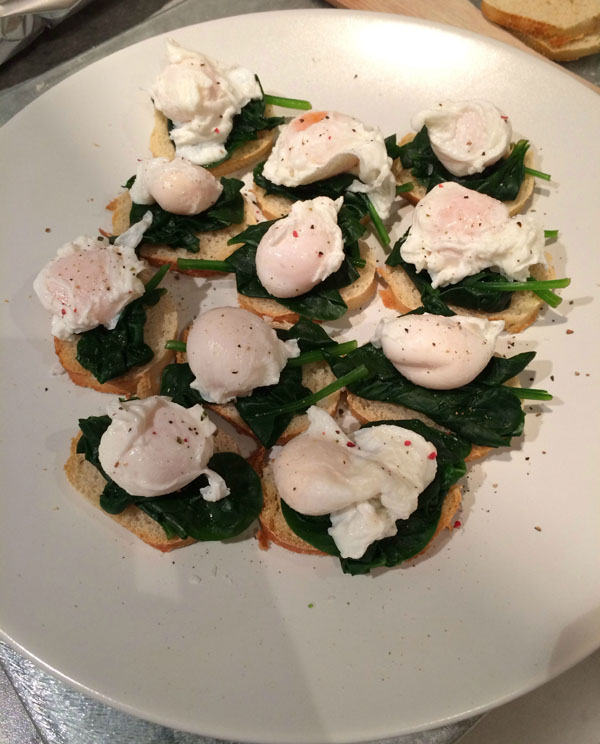 Warning: Food Porn Ahead! Indulge in a captivating plate of eggs and spinach.