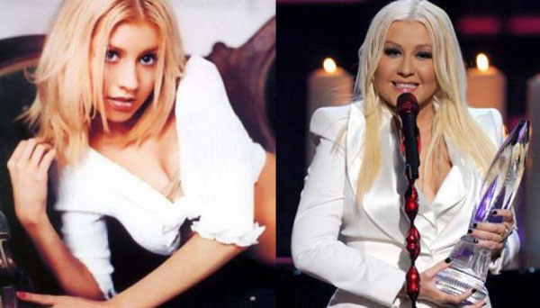 Christina Aguilera, a pop star of the 90's, holding an award.
